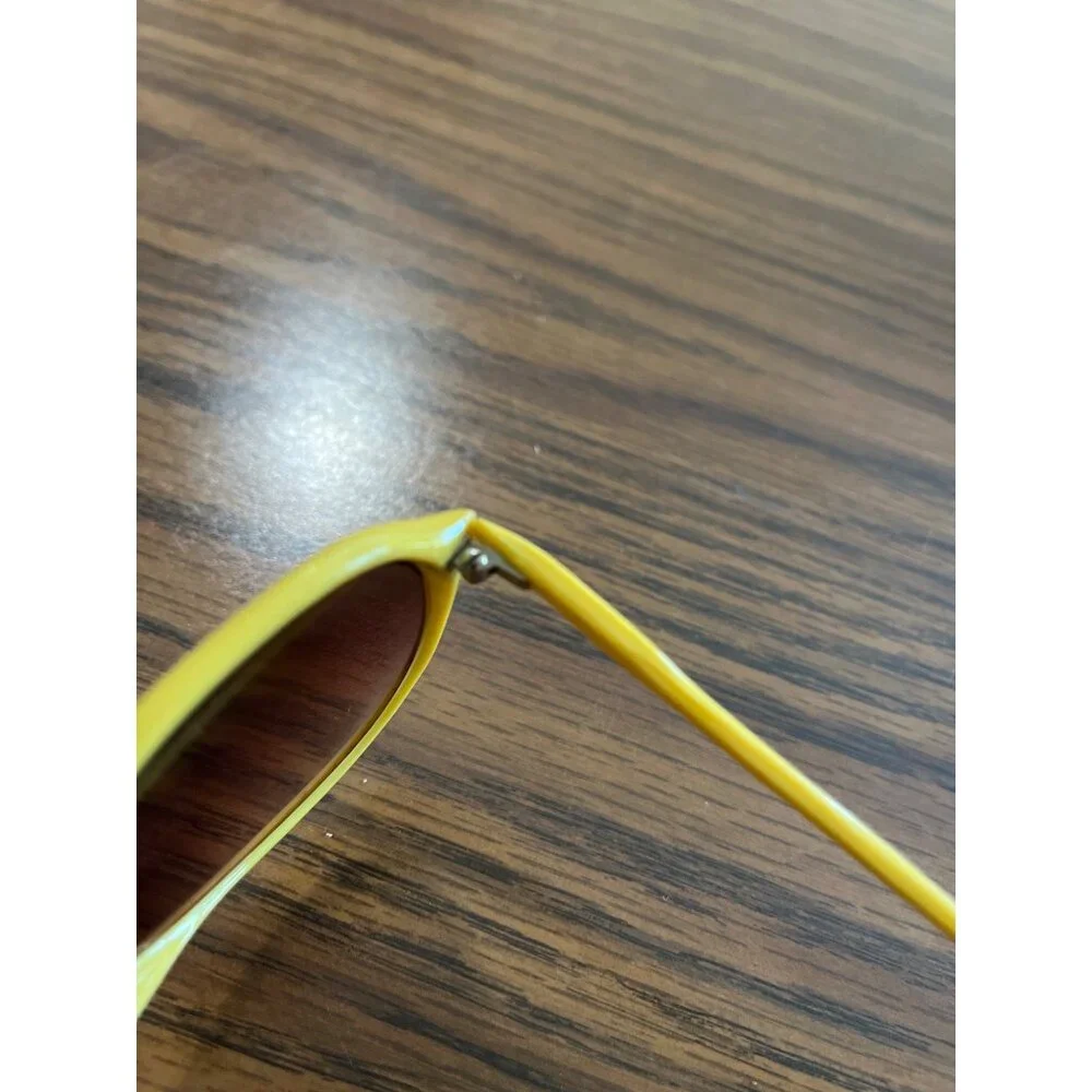 Stylish yellow framed Featherlite aviator sunglasses